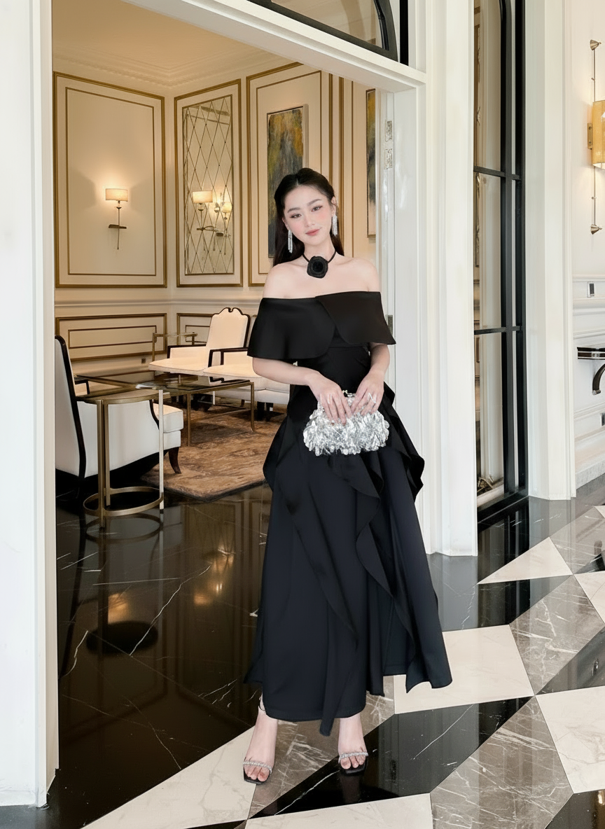 Model Wearing Black Off-Shoulder Ruffled Skirt Dress in Luxurious Setting