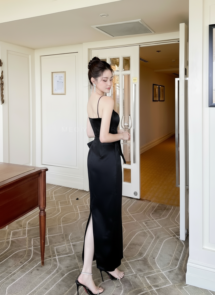Back View of black 2-Strap Dress Showing Strappy Design and Silhouette