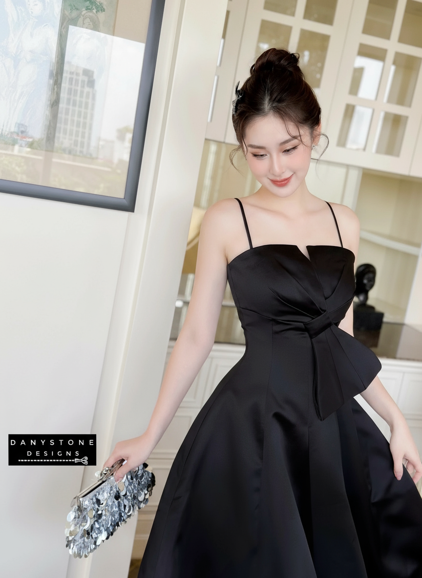 Side View of Black 2-Strap Bow Accent Dress Highlighting Fabric and Design