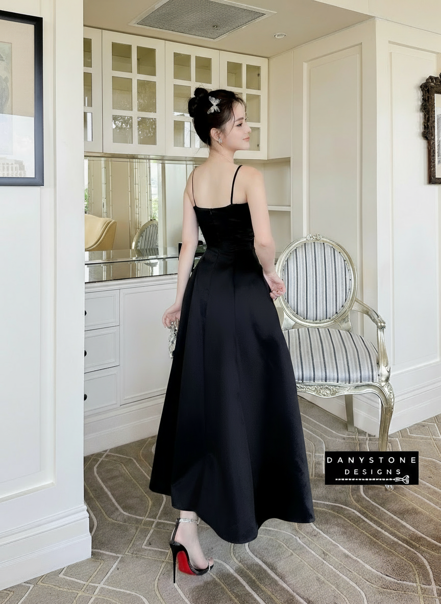 Back View of Black 2-Strap Dress Showcasing A-Line Silhouette and Bow