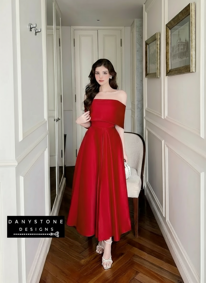 View of Red Off-Shoulder Dress Showcasing Silky Fabric and Design