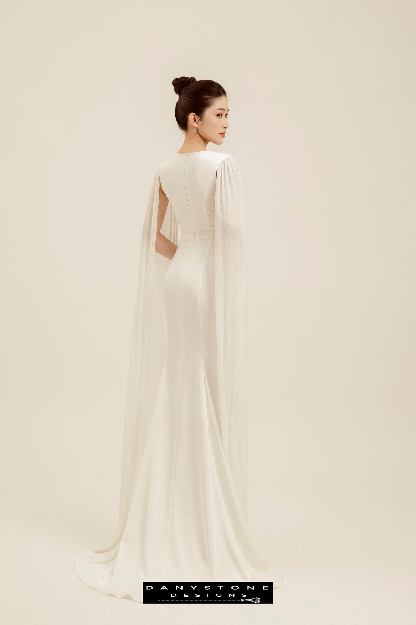 "Full-length view of Heart-Neck Satin Wedding Dress with embroidered hems"