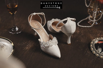 Back view of elegant bridal heels with crystal beaded floral design, featuring ankle straps.