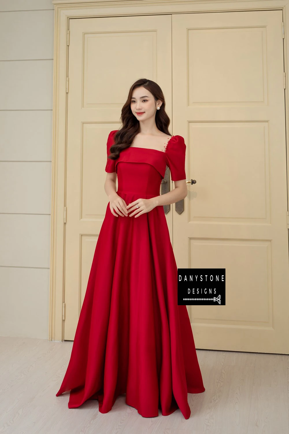 Full-Length View of Bride Wearing Elegant Red Ruffled Wedding Dress