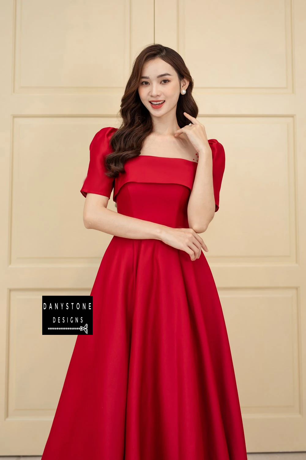 Detailed View of Square Neckline and Pearl-Embellished Sleeves of Red Ruffled Wedding Dress