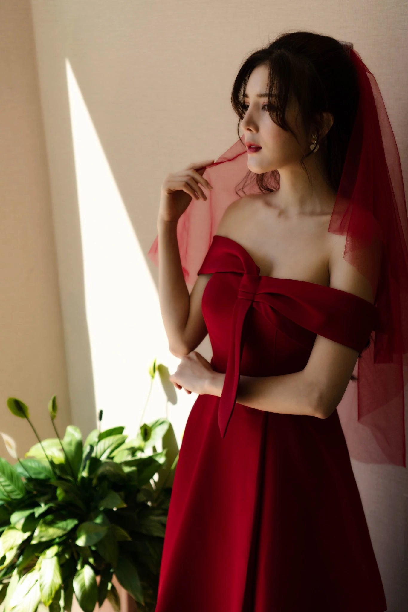 Full-Length View of Red Off-the-Shoulder Wedding Dress with Thigh-High Slit