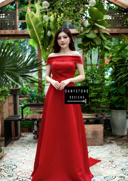 Full-Length View of Red Off-the-Shoulder Wedding Dress with Train