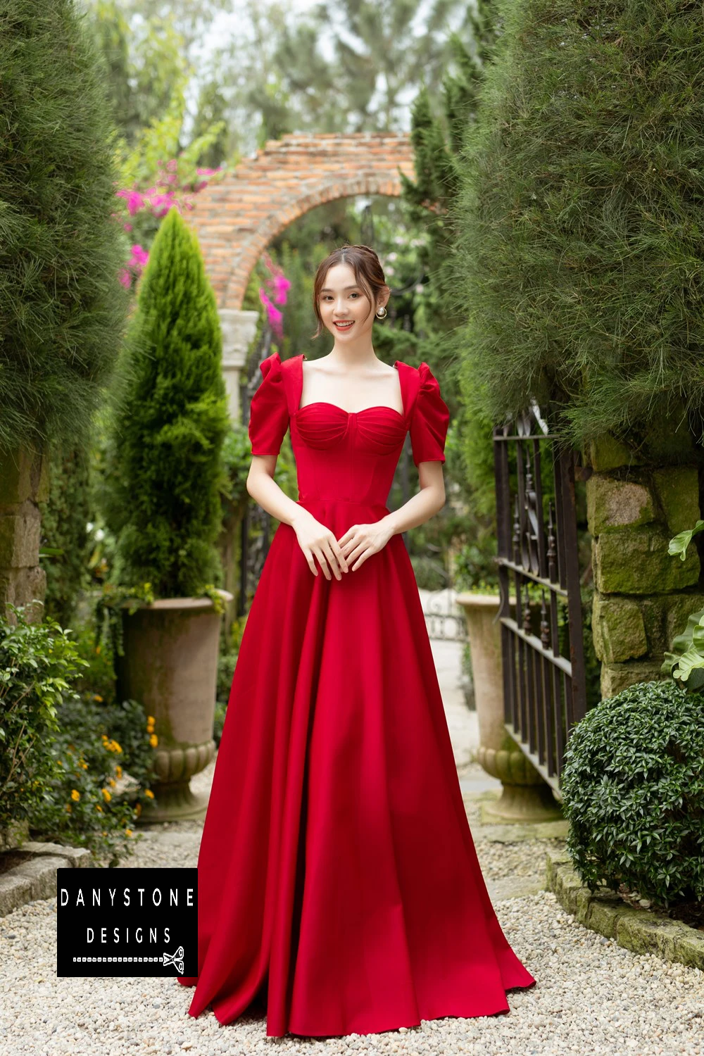 Detailed View of Puff Sleeves and Pleated Bust on Red Wedding Dress