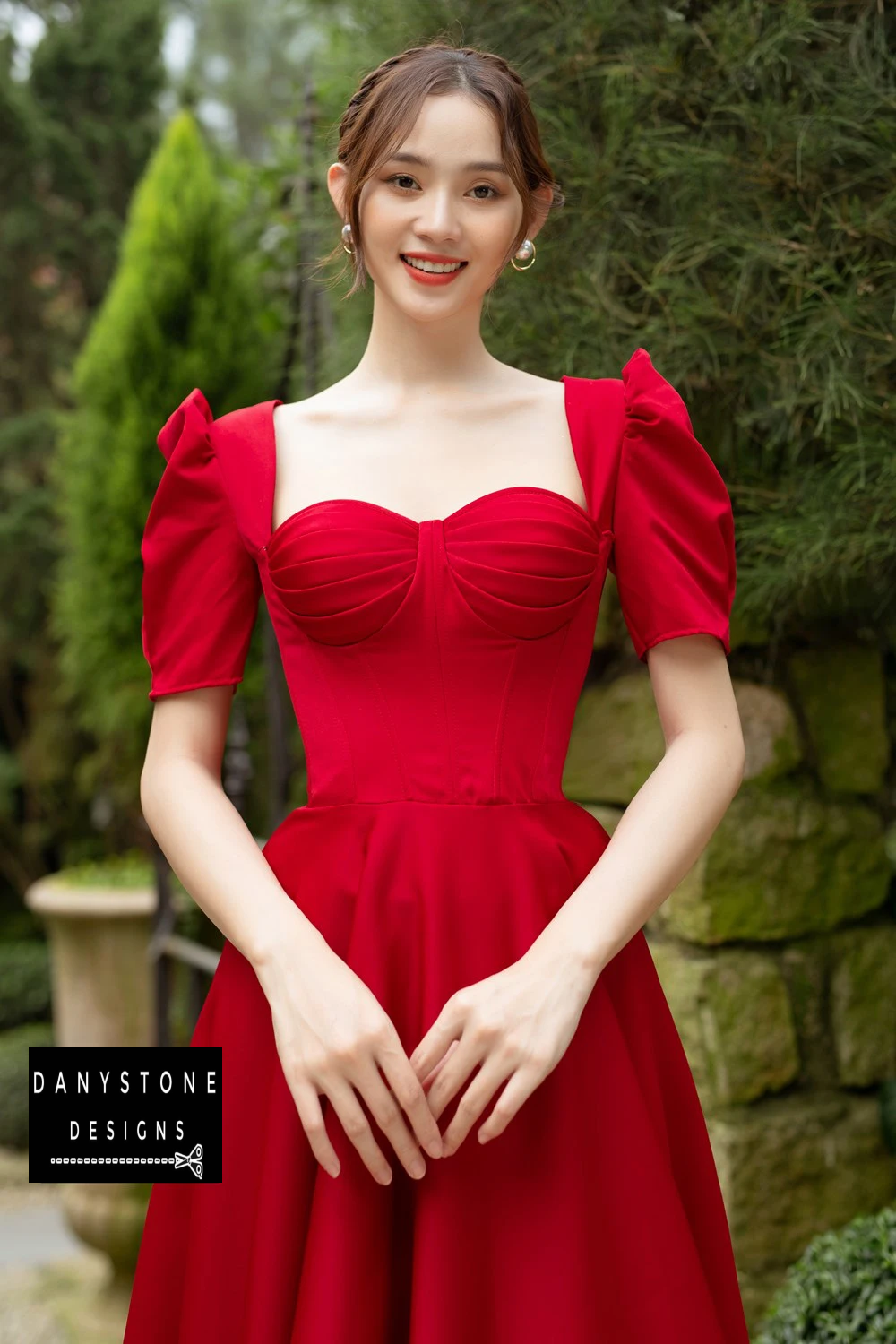 Close-Up of Pleated Bust and Puff Sleeves on Red Wedding Dress