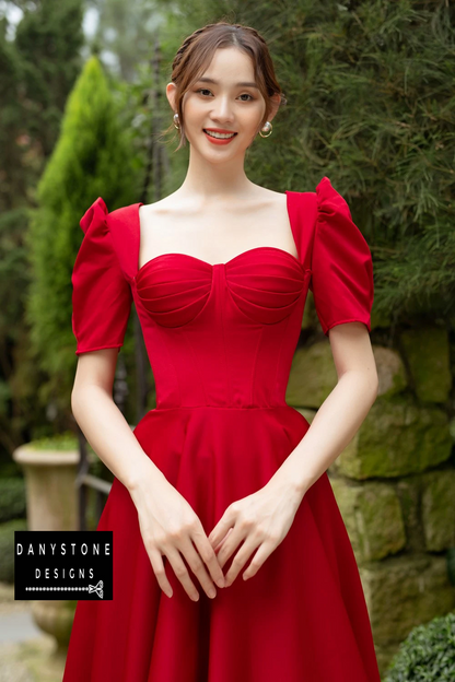 Close-Up of Pleated Bust and Puff Sleeves on Red Wedding Dress