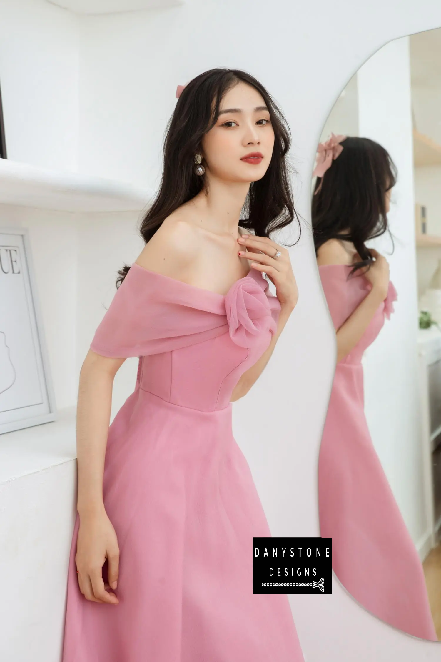 Detailed View of Off-the-Shoulder Design on Pink Wedding Dress