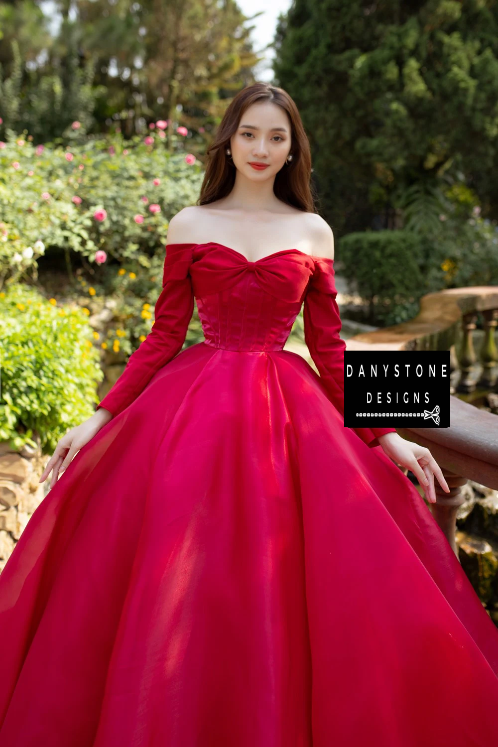 Front View of Crimson Off-the-Shoulder Silk Wedding Dress Highlighting Bow Detail