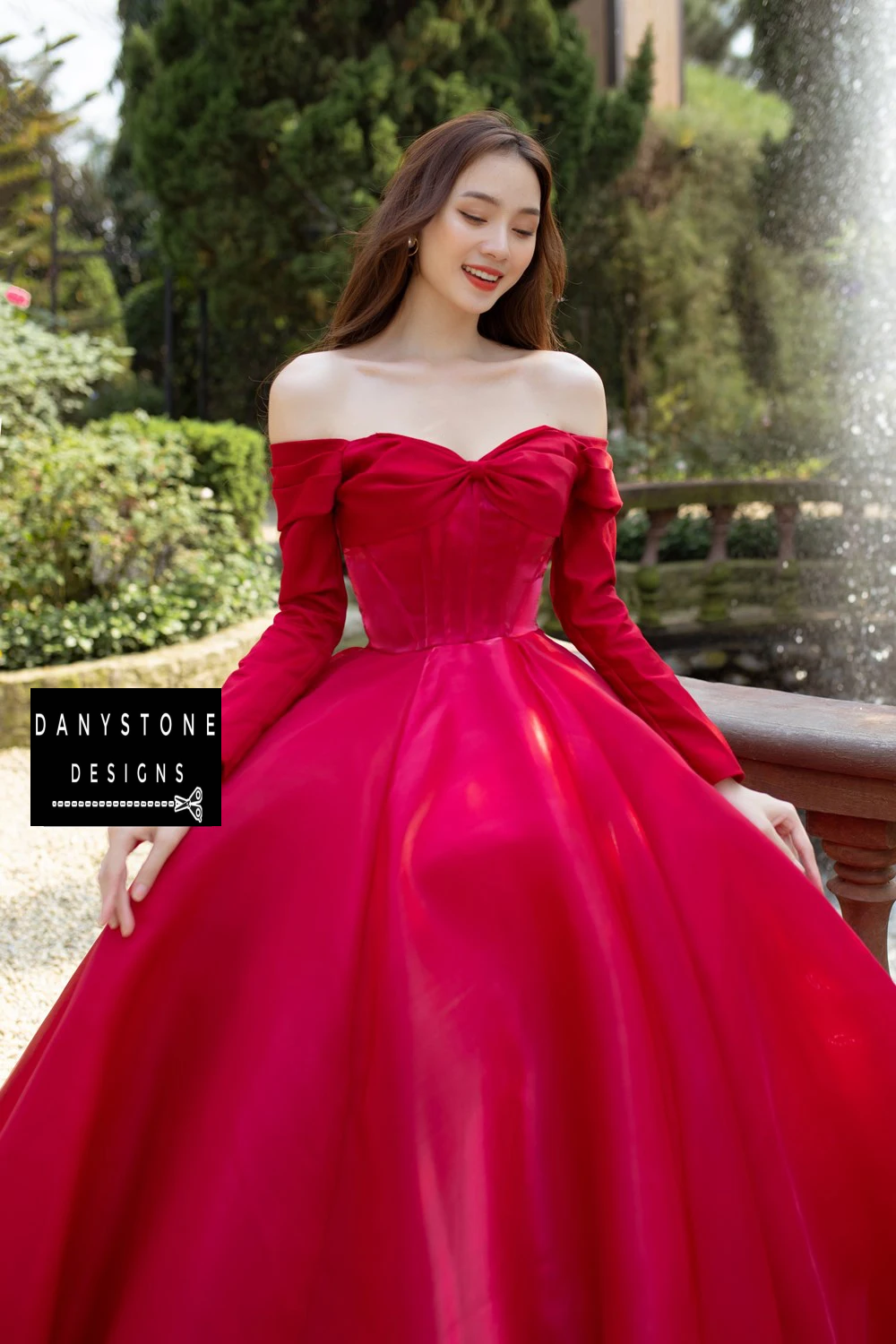 Full-Length View of Bride in Crimson Silk Wedding Dress with Flowing Skirt