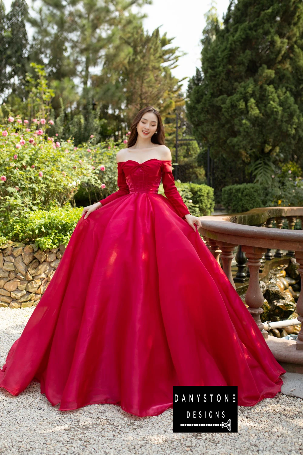 Close-Up of Fabric Texture and Bow Detail on Crimson Wedding Dress