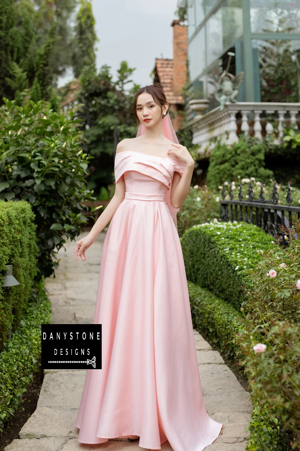 Side View Highlighting Waist-Hugging Belt on Pink Wedding Dress