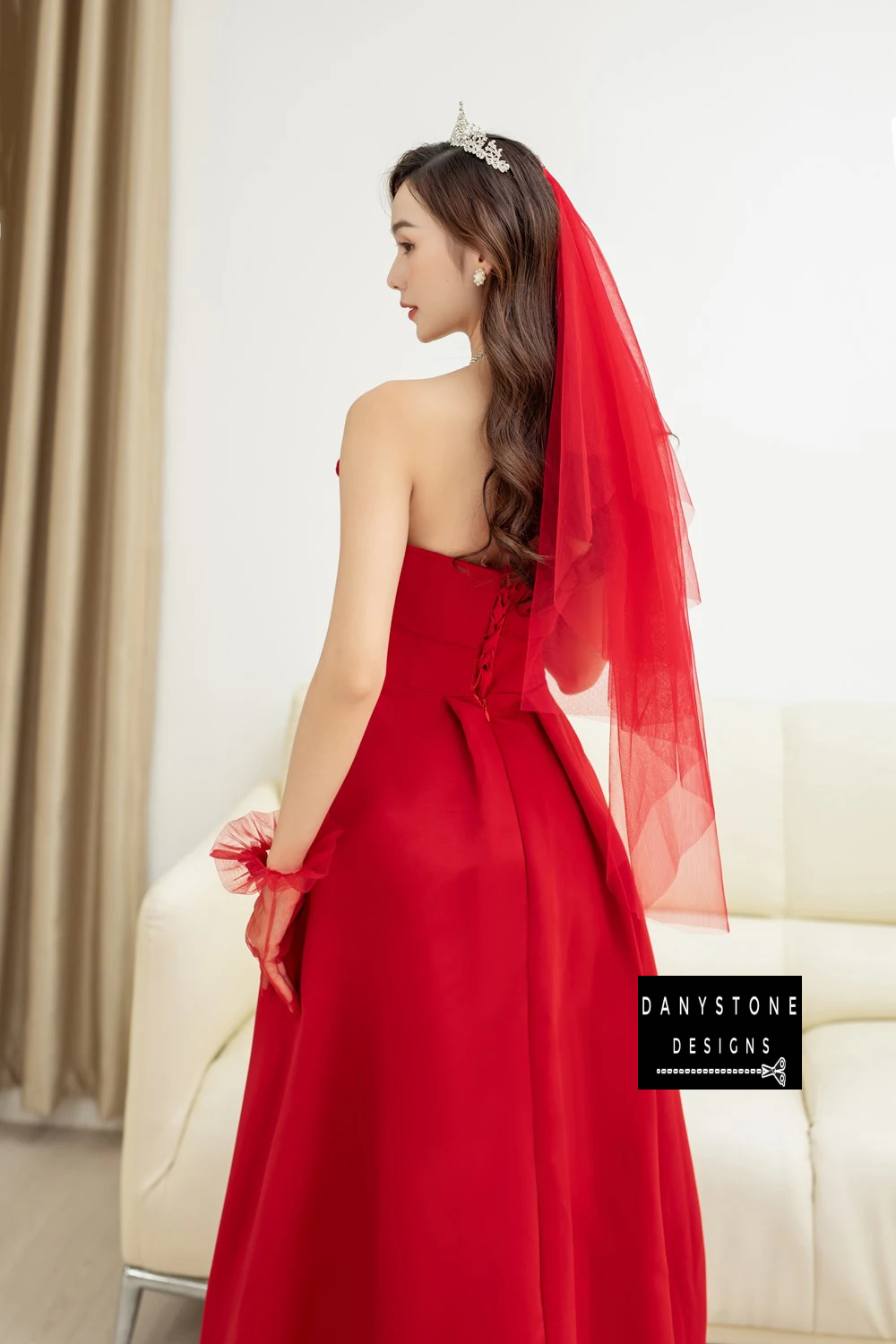 Back View of Red Off-the-Shoulder Wedding Dress with Floor-Length Skirt