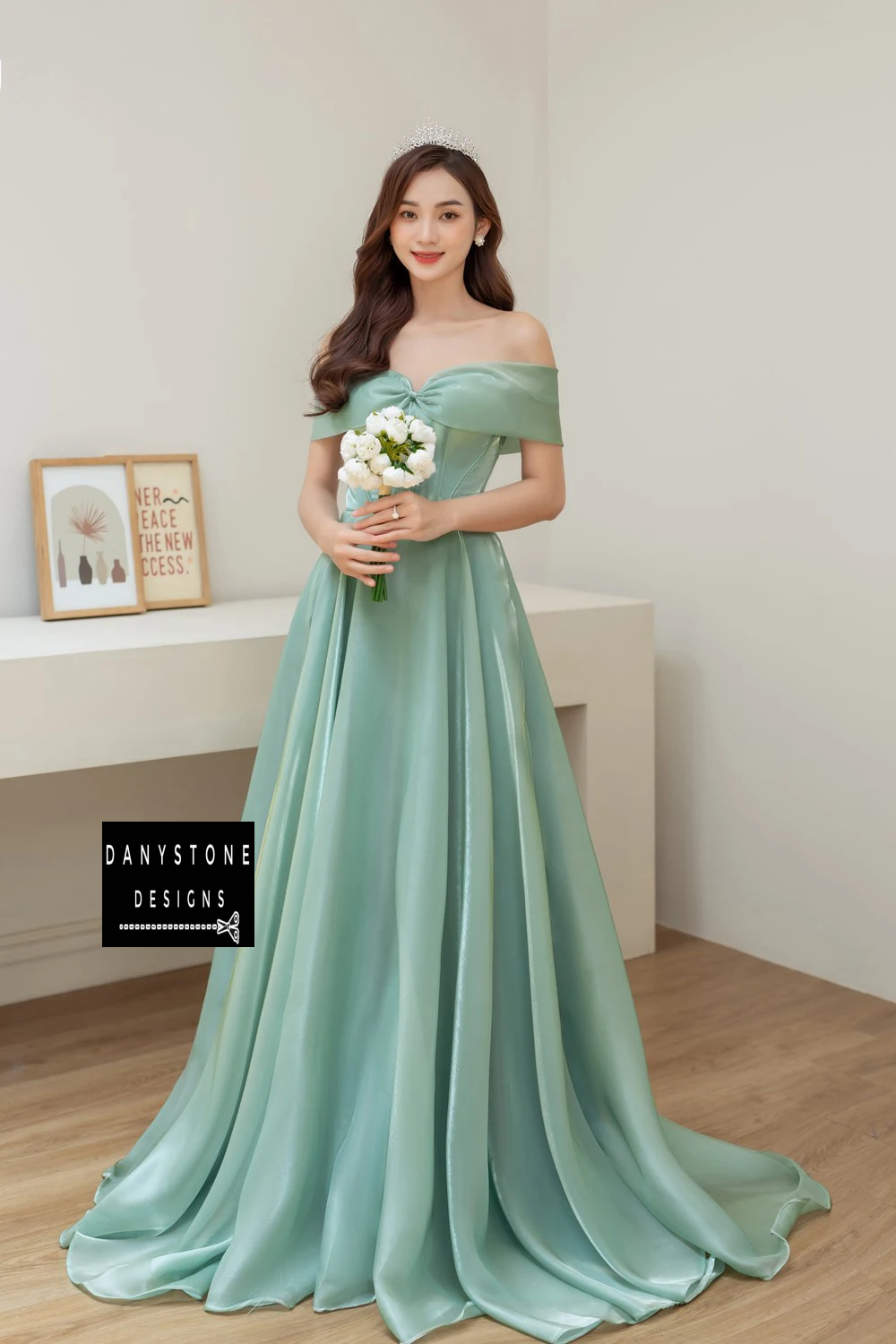 Side View Highlighting Bow and Pleated Skirt on Moss Green Wedding Dress