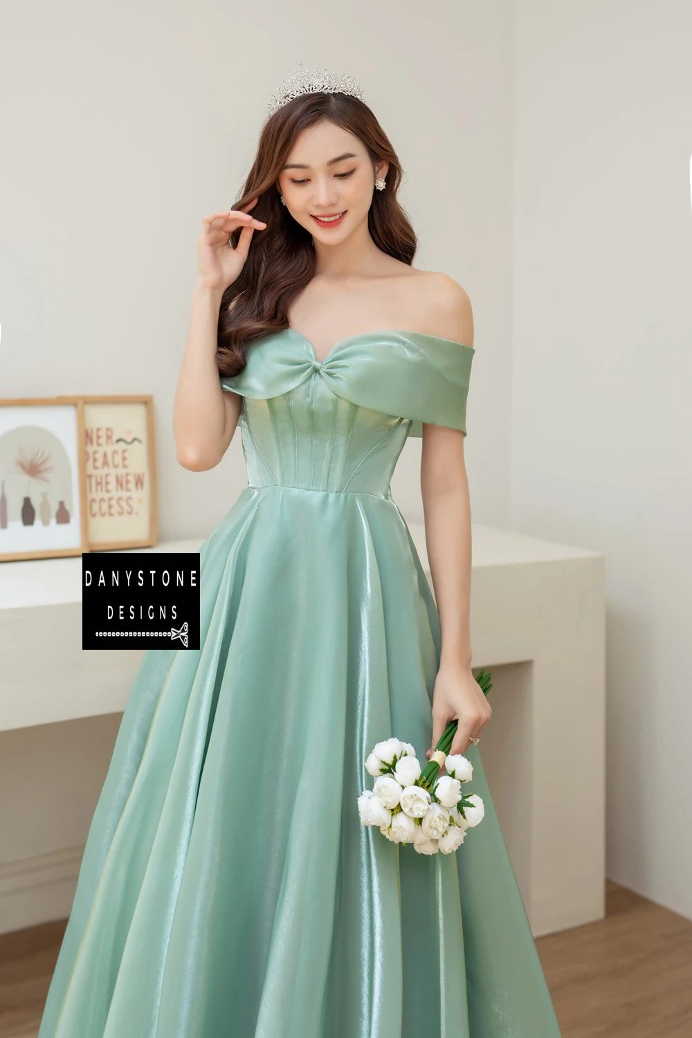 Bride Smiling in Moss Green Off-the-Shoulder Silk Wedding Dress with Bow