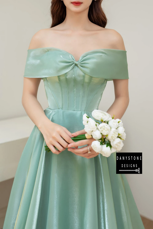 Close-Up of Off-the-Shoulder Bow Design on Moss Green Silk Wedding Dress