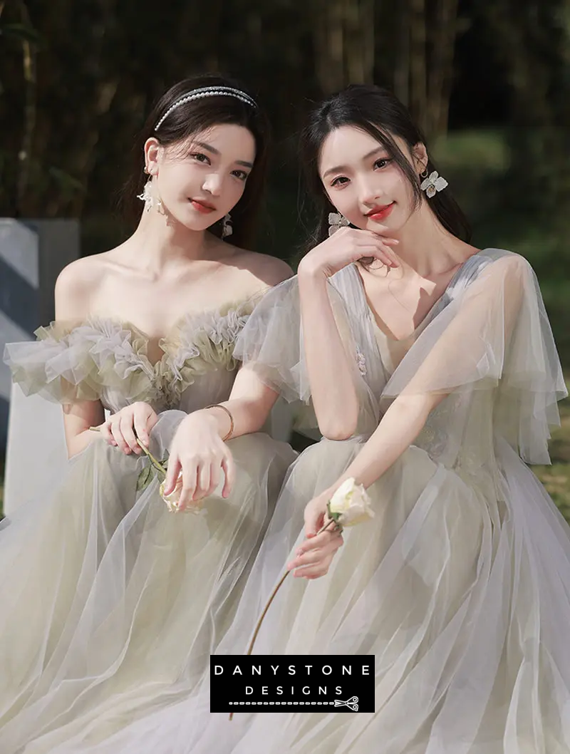 Models posing in green tulle wedding dresses outdoors