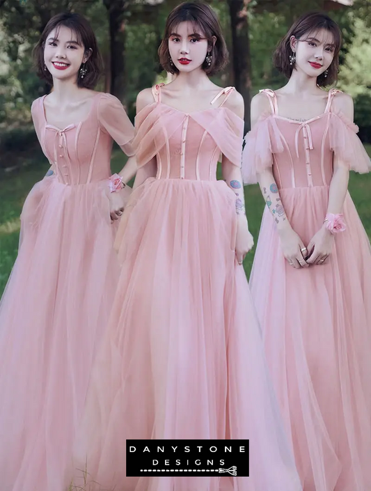 Model wearing sweet pink tulle prom party ball gown