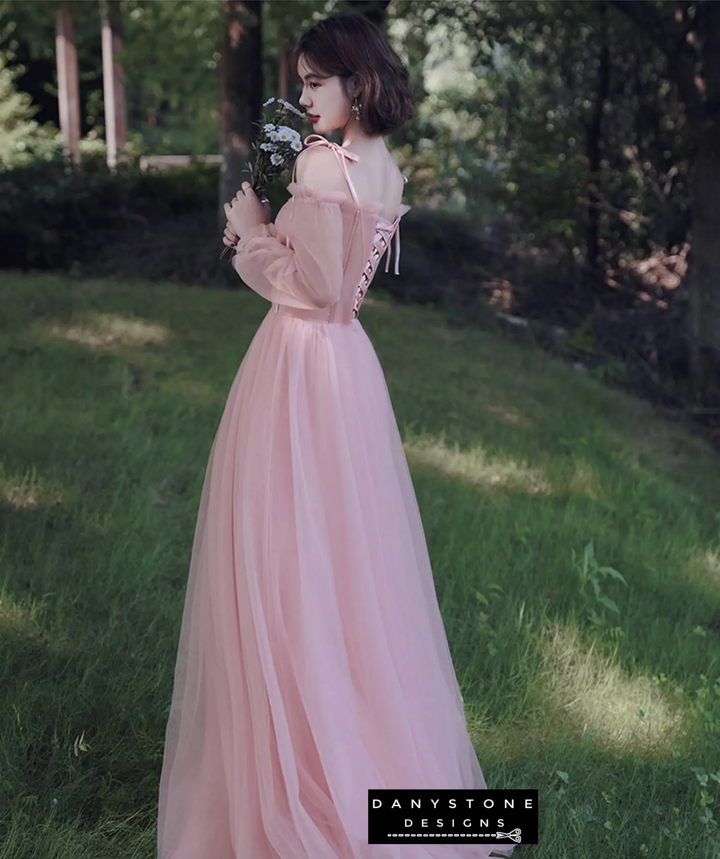 Sophisticated pink tulle ball gown with intricate details