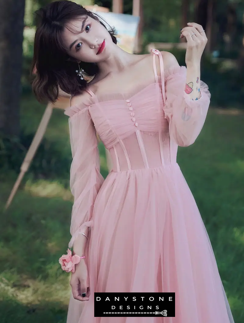 Front view of elegant pink tulle ball gown