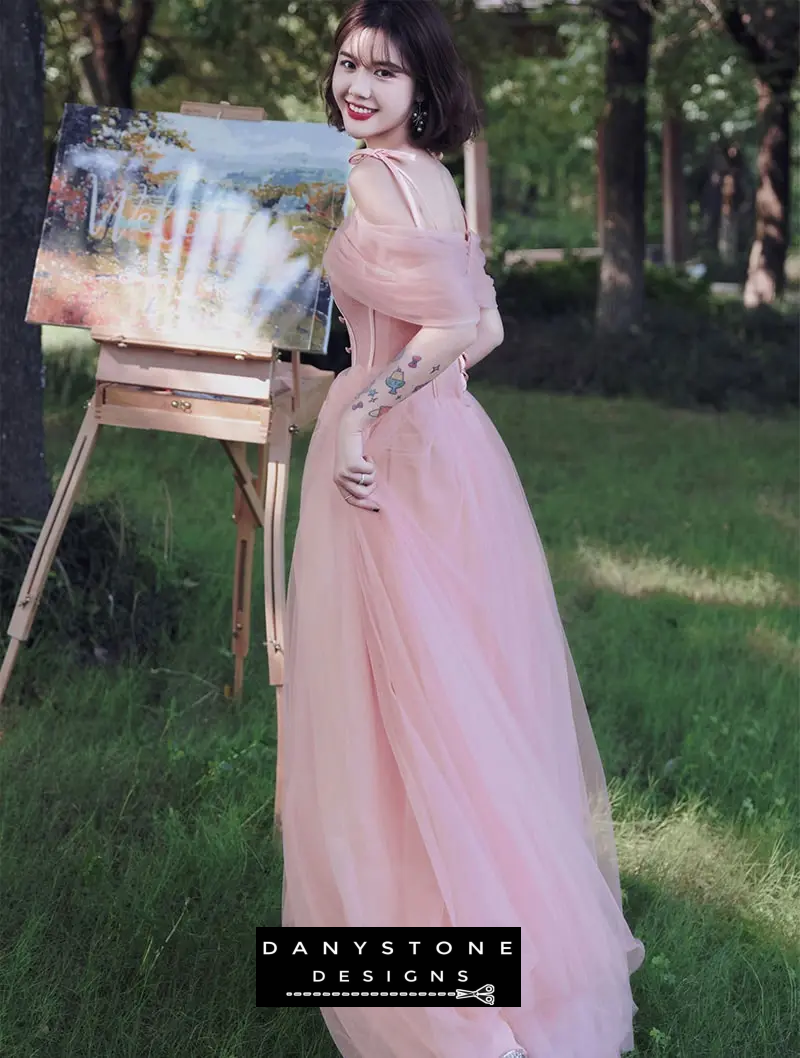 Back view of sweet pink tulle bridesmaid dress