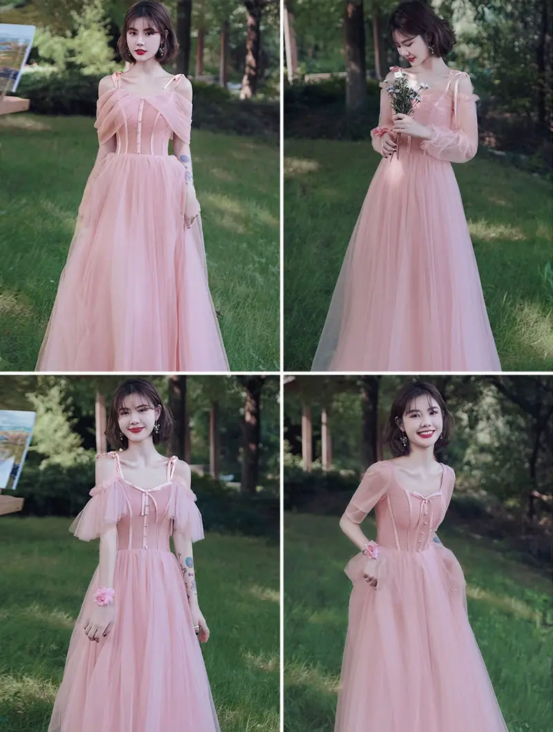 Model posing in pink tulle prom dress outdoors