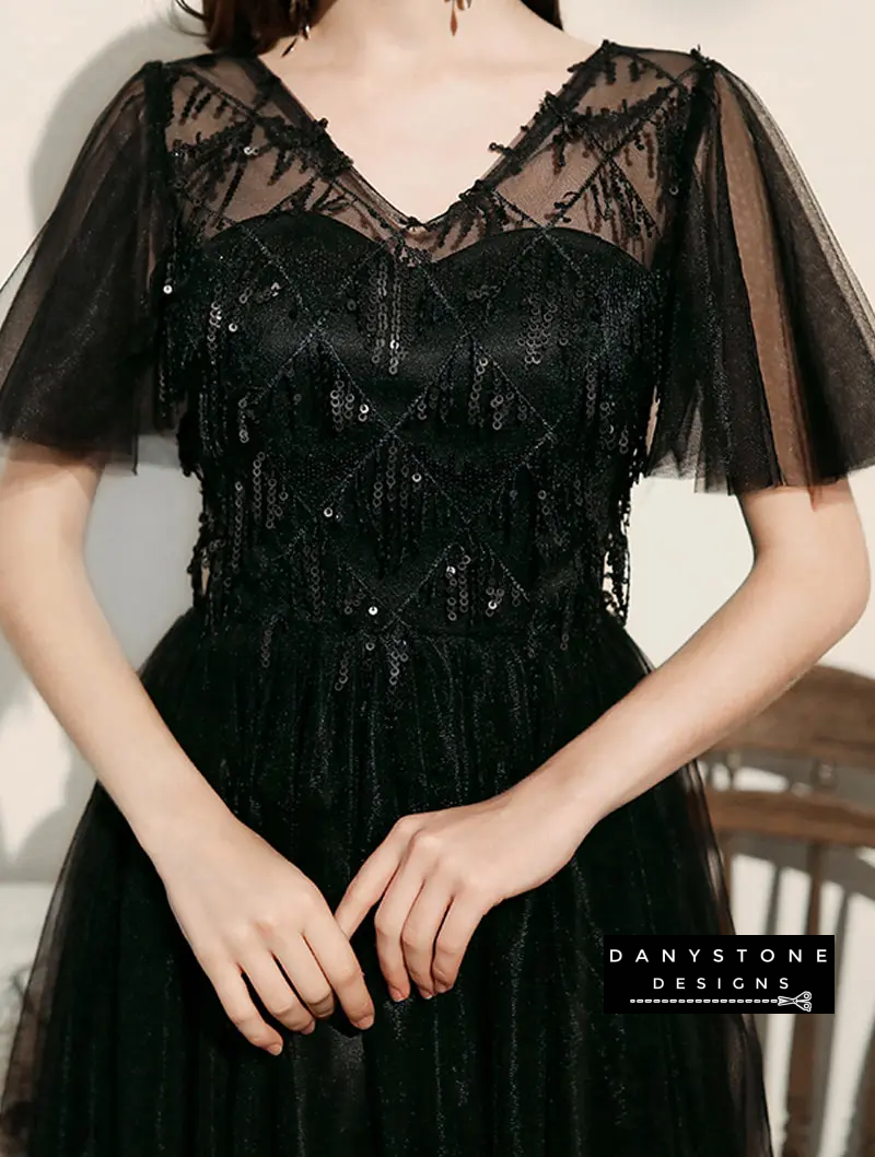 Close-up of black chiffon dress lace bodice