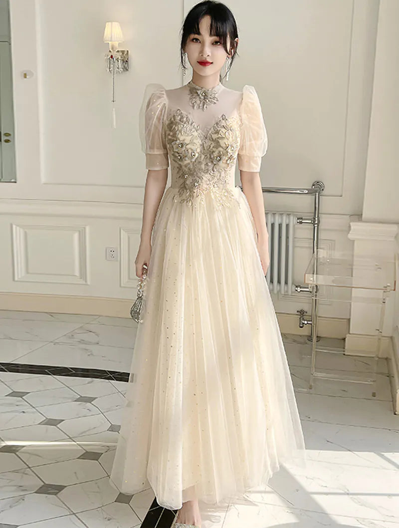 Champagne evening dress with puff sleeves