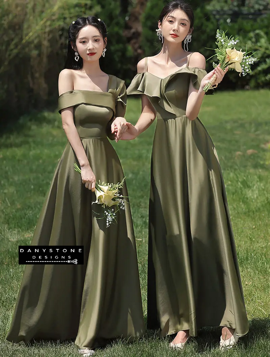 Models wearing green satin bridesmaid dresses