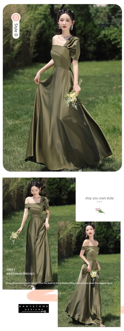 Models showcasing green satin dresses in a garden