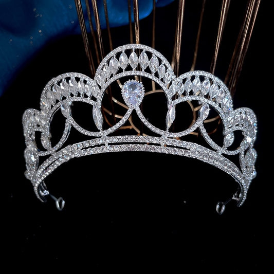 6cm high princess-style bridal crown with shimmering crystals, perfect for adding a regal touch to bridal looks.