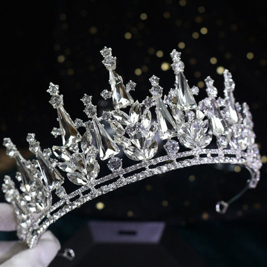 Majestic Crystal Bridal Crown with a height of 7.5cm and width of 16cm, featuring sparkling crystals in an intricate design.