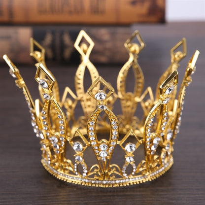 Golden bridal crown designed for high bun hairstyles, featuring sparkling crystals and a 9cm diameter with an 11cm height.