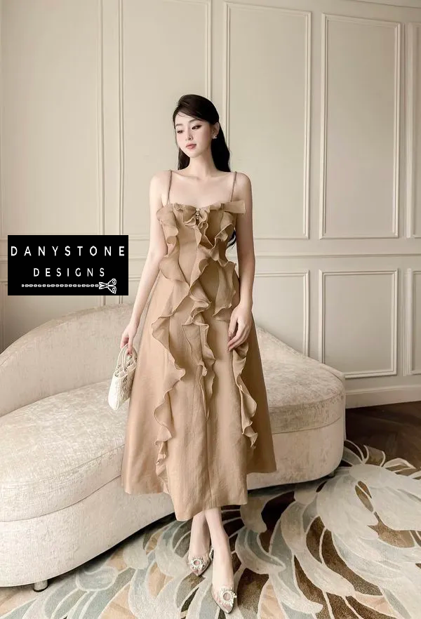 Model Wearing Brown 2-Strap Ruffled Dress in Elegant Room