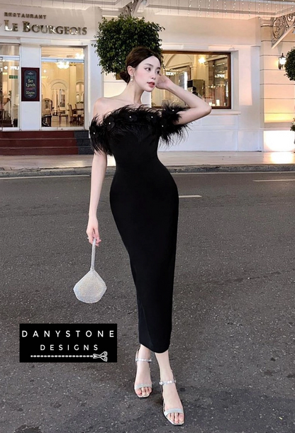 Model showcasing glamorous off-shoulder bodycon dress in black