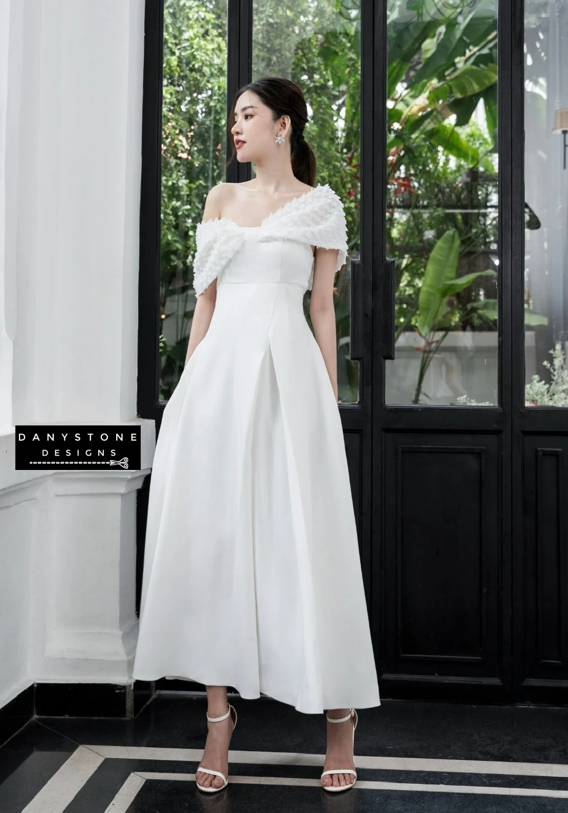 Elegant off-shoulder bow flared dress with chiffon in white - full-length view