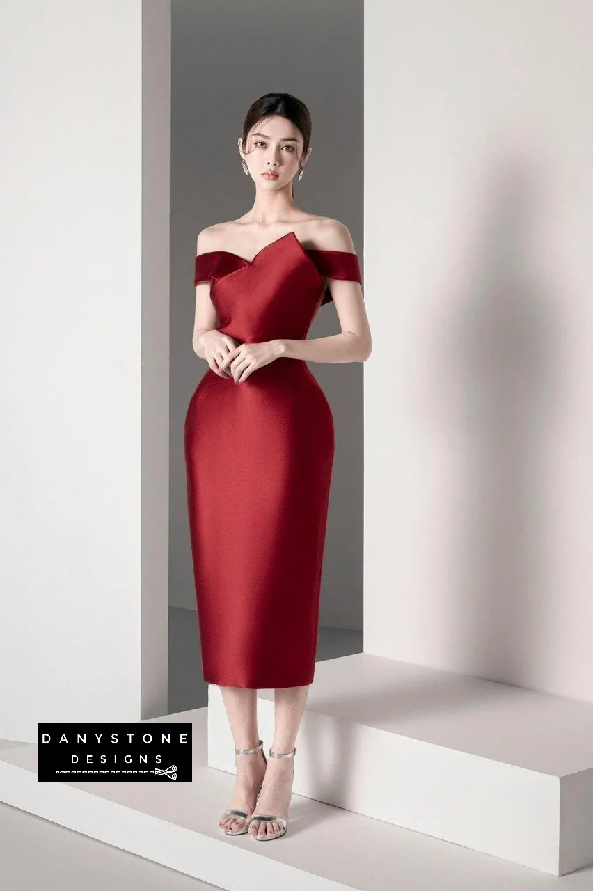 Back view of Belle of the Ball off-shoulder dress with puffy skirt in red