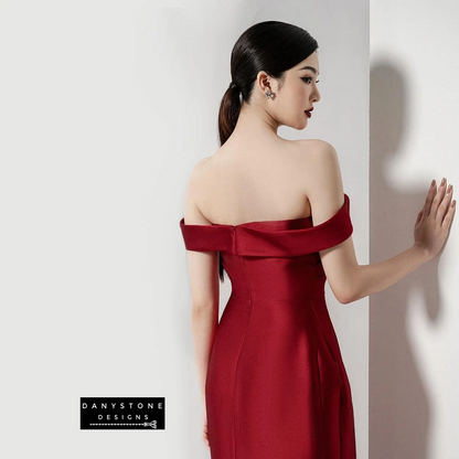 Back view of Belle of the Ball off-shoulder dress with puffy skirt in red