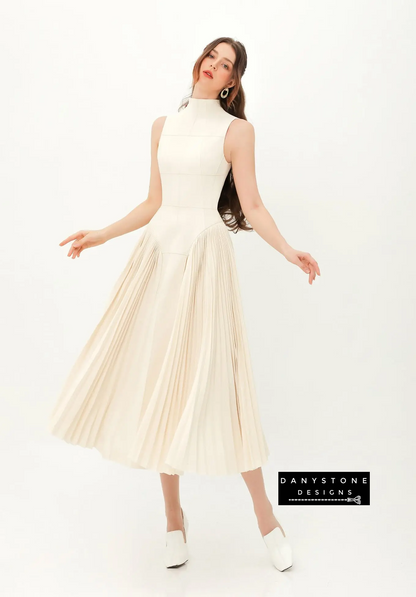 Model showcasing elegant high neck sleeveless flared dress in ivory