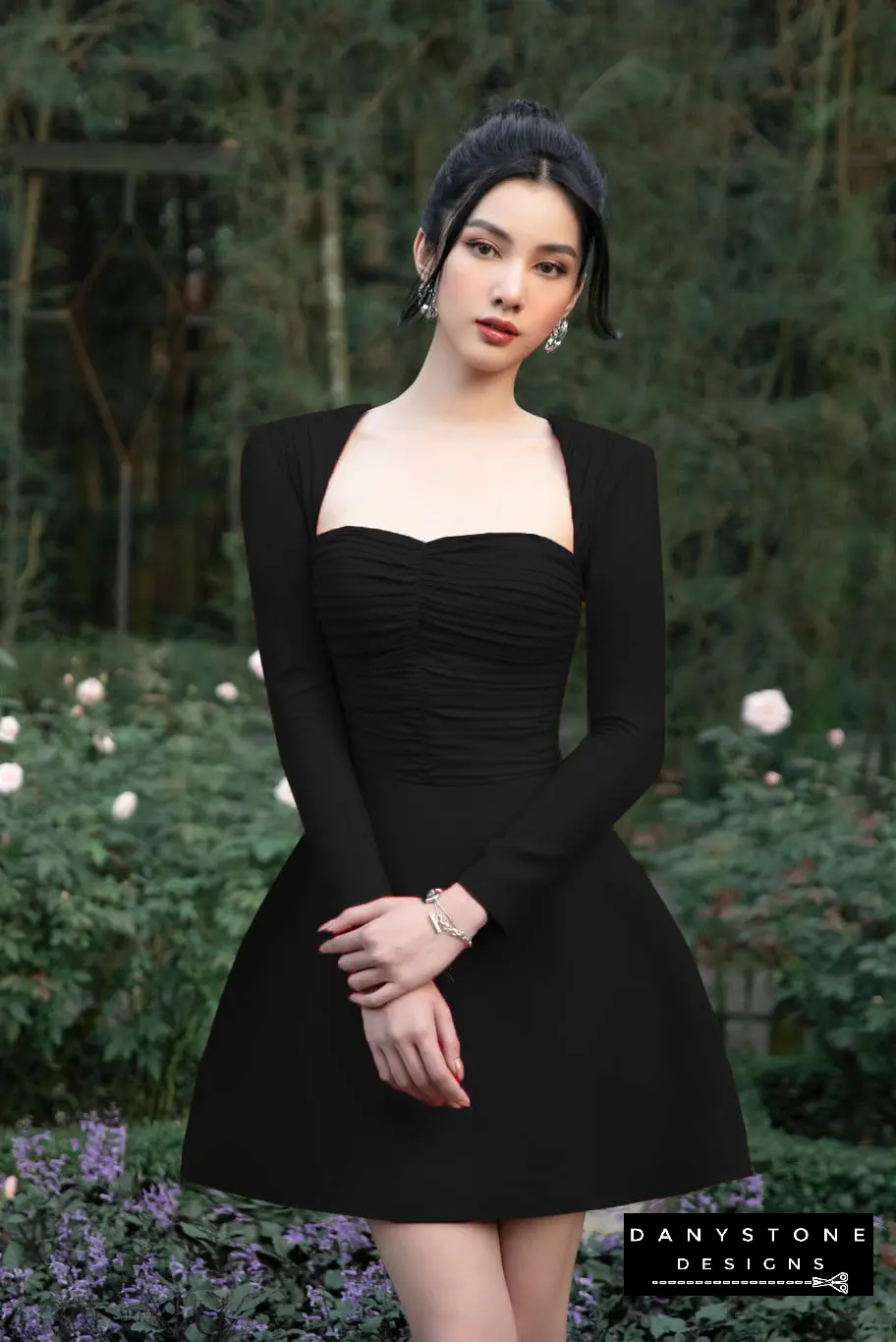 Black Silk-Pressed Long Sleeve U-Neck A-Line Dress in an Elegant Evening Setting