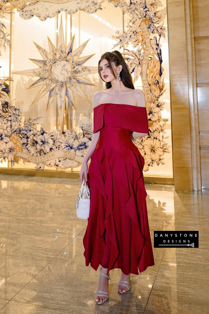 Model Wearing Red Off-Shoulder Ruffled Skirt Dress in Elegant Setting