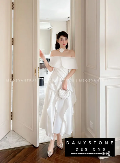 View of White Off-Shoulder Ruffled Skirt Dress Showing Elegant Flow