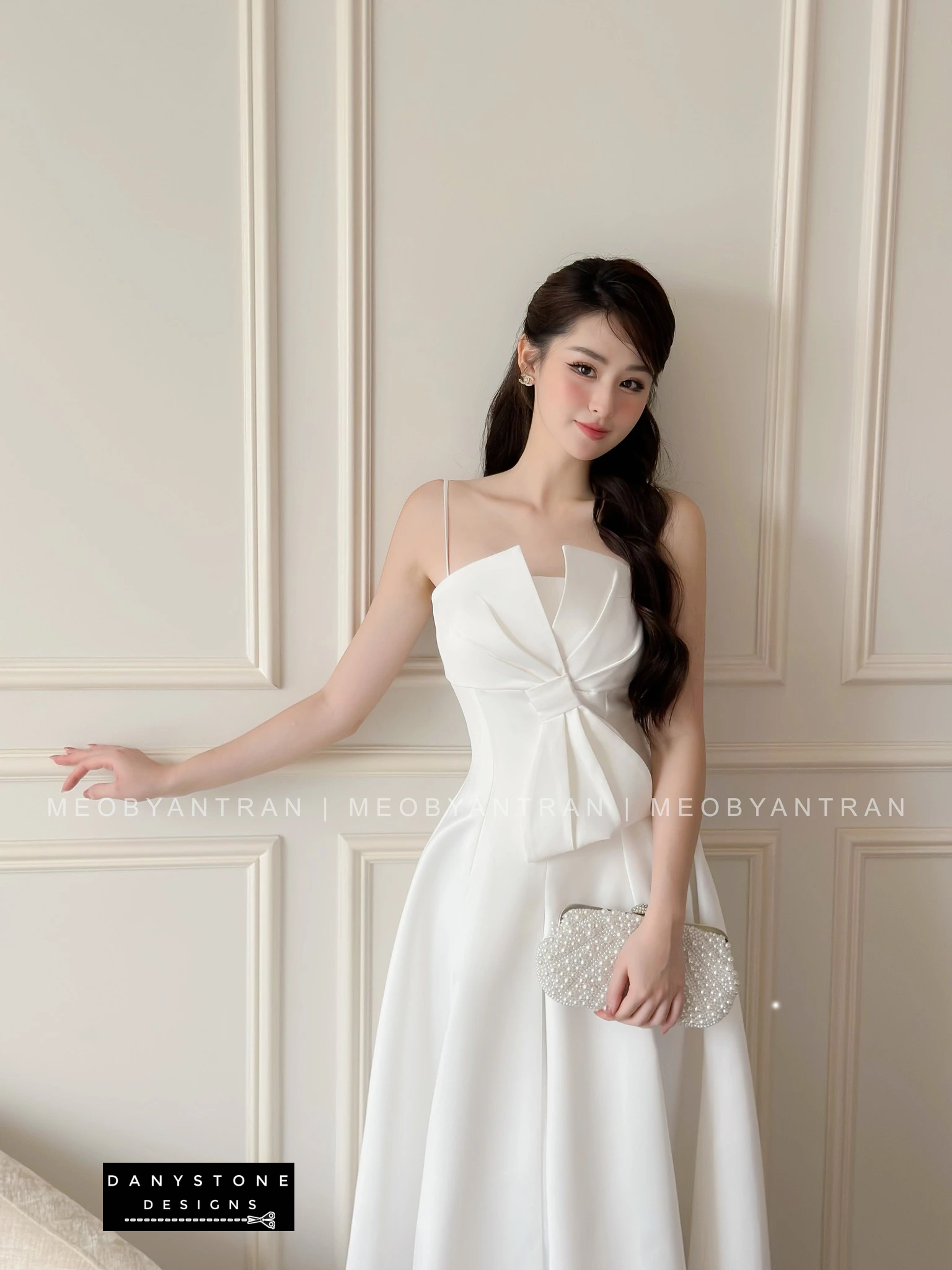 View of White 2-Strap Dress Highlighting Strappy Design and Silhouette