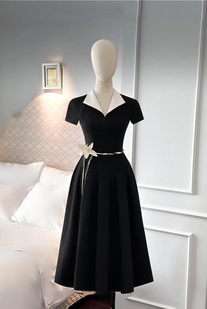 Casual look in A-line black dress with white collar