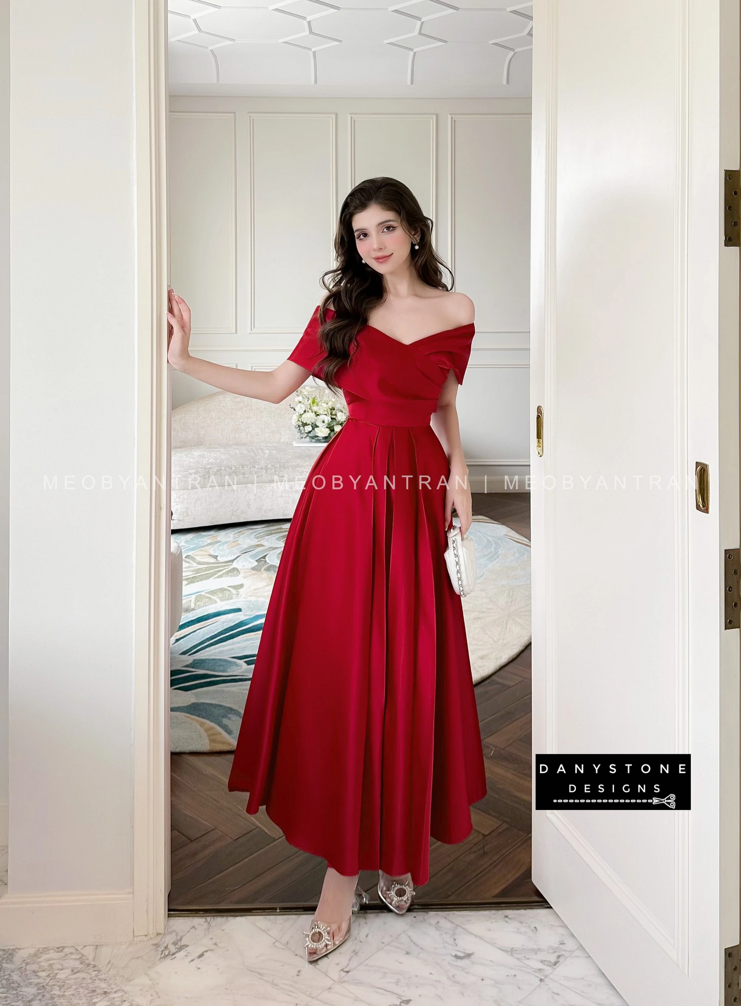 View of Red Off-Shoulder Dress Highlighting Flowing Silhouette