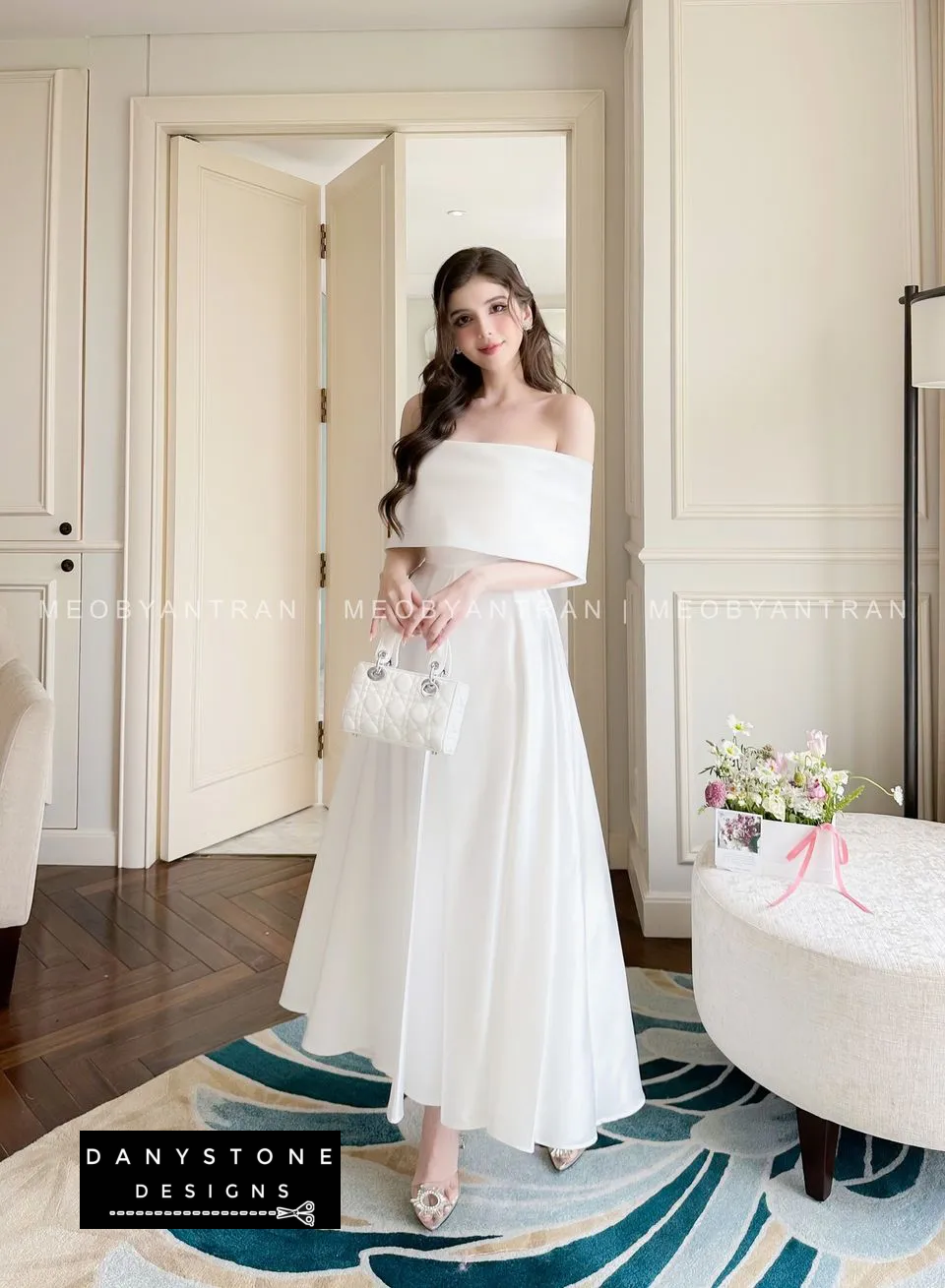 Front View of White Off-Shoulder Party Dress Emphasizing Classic Design