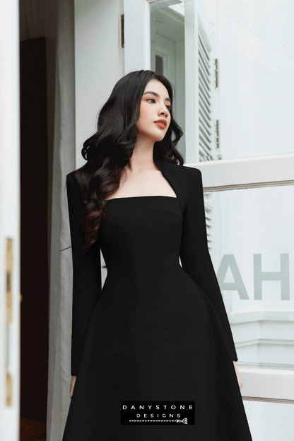 Front View of Black Long Sleeve Flared Dress Showcasing Classic Design